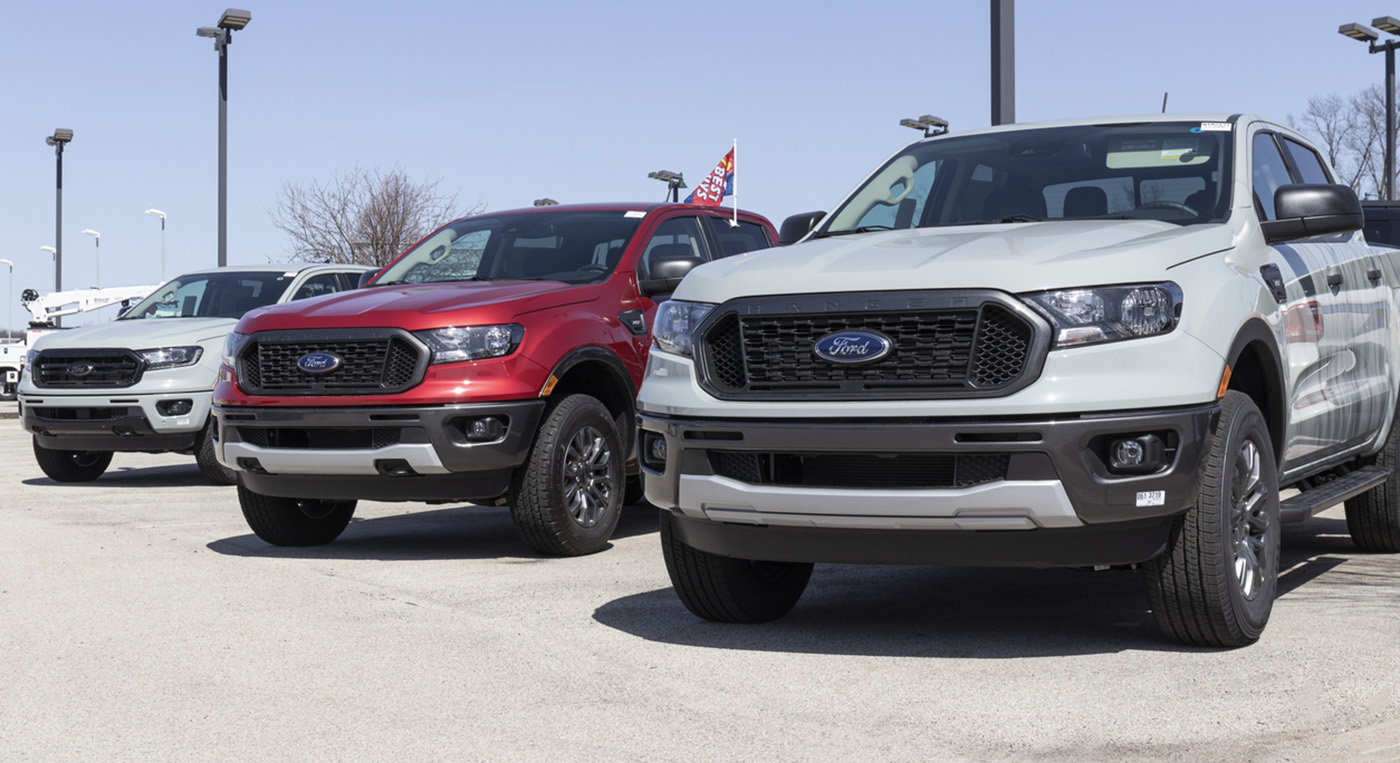 Ford Ranger pickup truck display at a dealership. The Ranger nameplate has been used on multiple light duty trucks models sold by Ford.